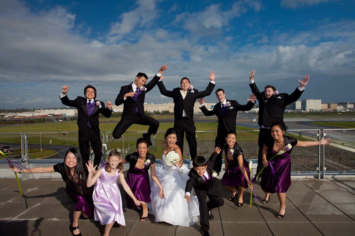 Leahnor & Eric - Future of Flight wedding Wedding party getting crazy on the rooftop at Future of Flight museum in Mukilteo